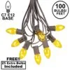 100 C7 String Light Set With Yellow Bulbs On Brown Wire