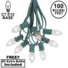 100 C7 String Light Set With Clear Bulbs On Green Wire