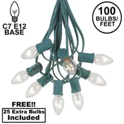 100 C7 String Light Set With Clear Bulbs On Green Wire