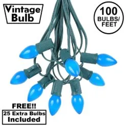 100 C7 String Light Set With Blue Ceramic Bulbs On Green Wire
