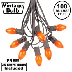 100 C7 String Light Set With Orange Ceramic Bulbs On Brown Wire