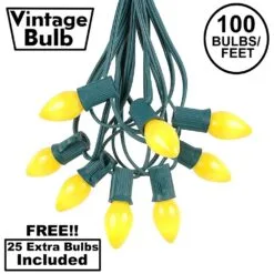 100 C7 String Light Set With Yellow Ceramic Bulbs On Green Wire