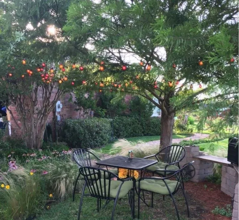 100 G30 Globe String Light Set With Orange Satin Bulbs On Brown Wire 2 100 G30 Globe String Light Set With Orange Satin Bulbs On Brown Wire - Image 2